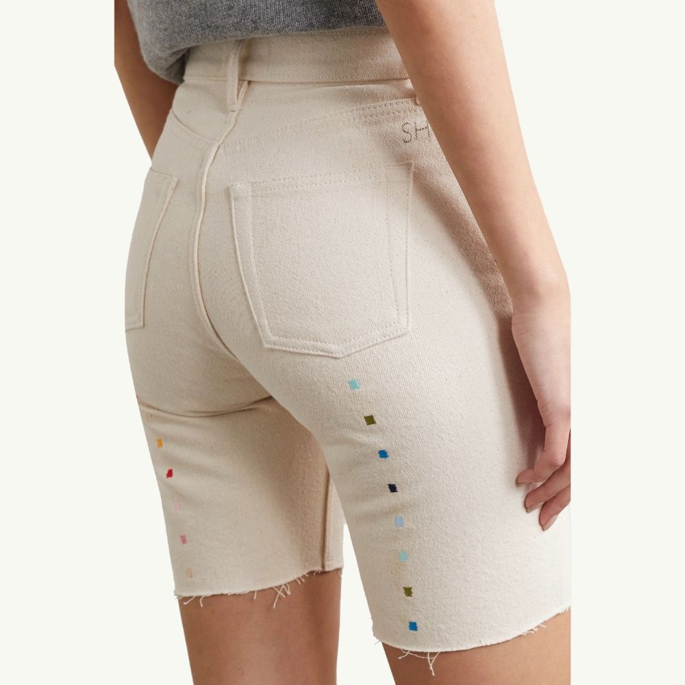 STILL HERE Technicolor frayed embroidered recycled denim shorts